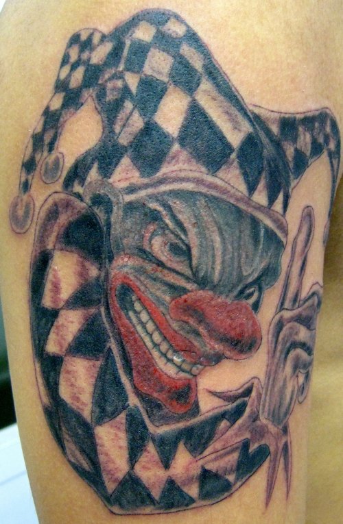 Awesome Colroed Jester Head Tattoo