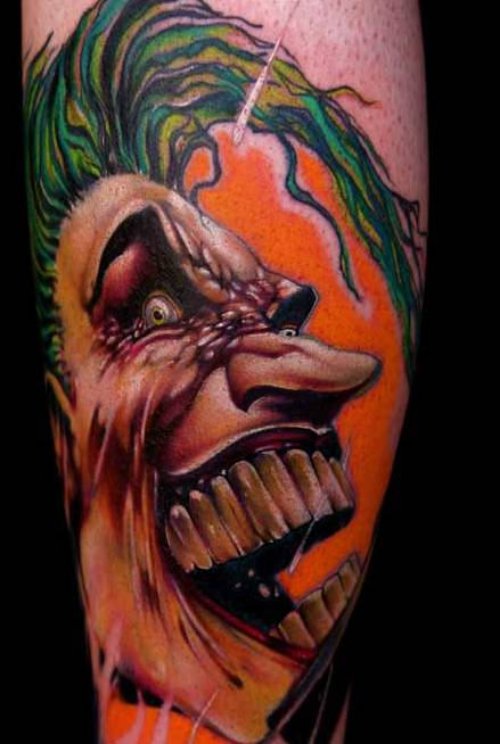 Awesome Colored Scary Clown Tattoo On Sleeve