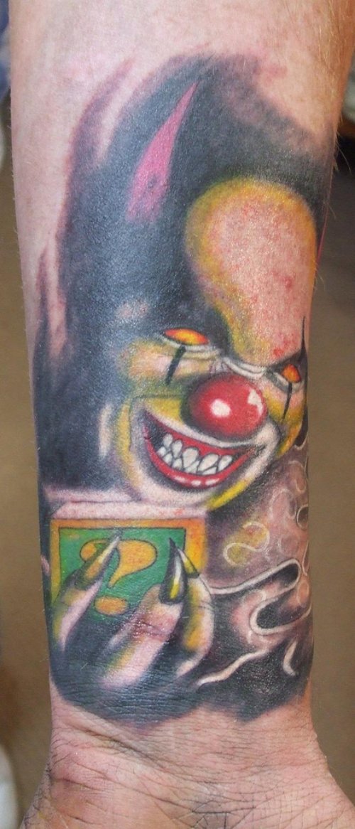 Color Jester Tattoo On Forearm