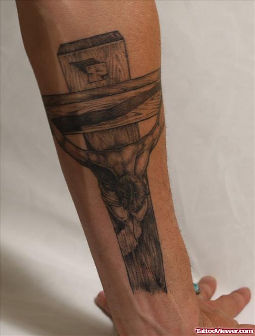 Realistic Grey Ink Cross And Jesus Christ Tattoo On Left Forearm