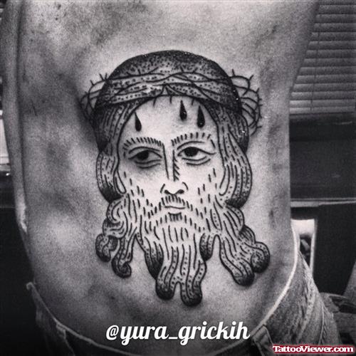 Grey Ink Jesus Head Tattoo On Man Side Rib
