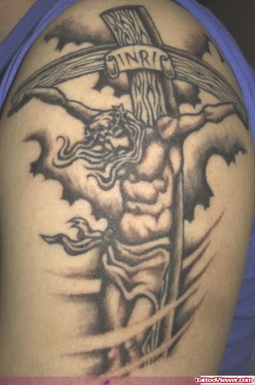 Grey Ink Cross Jesus Tattoo On Left Half Sleeve