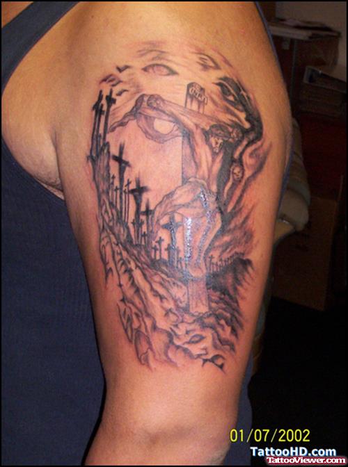 Grey Ink Jesus Tattoo On Left Bicep