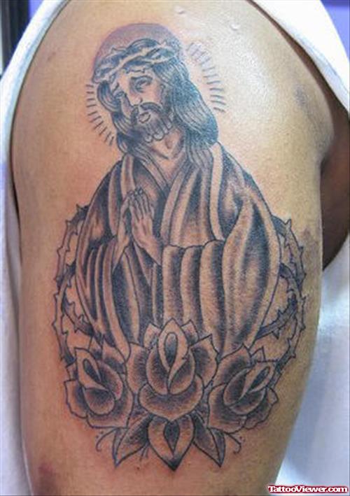 Grey Rose Flowers Jesus Christ Tattoo On Shoulder
