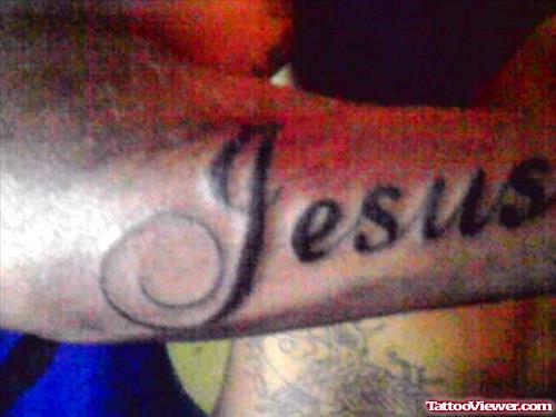 Jesus Name Tattoo On Right Arm