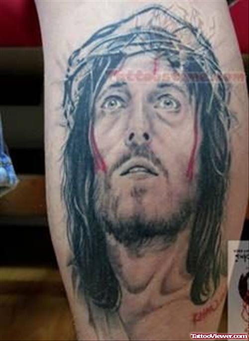 Amazing Grey Ink Jesus Tattoo On Inner Bicep