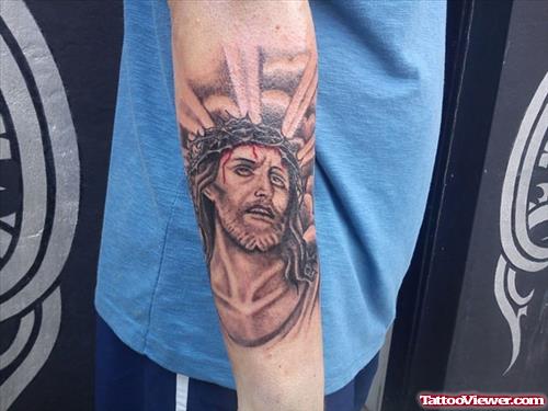 Grey Ink Jesus Head Tattoo on Sleeve