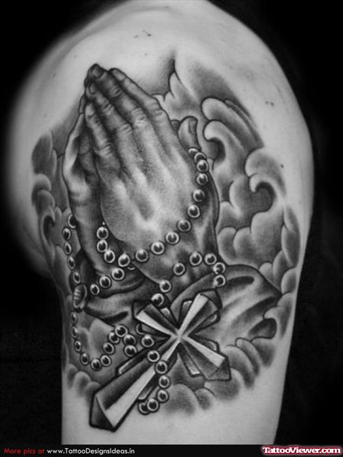 Grey Ink Praying Hands Jesus Christ Rosary Tattoo On Shoulder