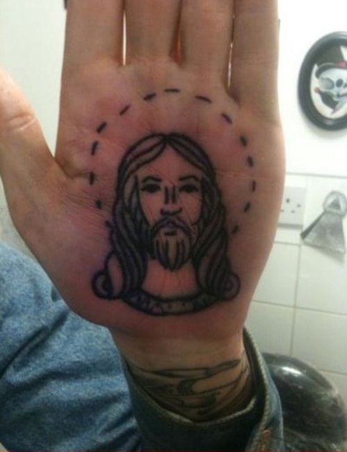 Grey Ink Jesus Tattoo On Left Hand Palm