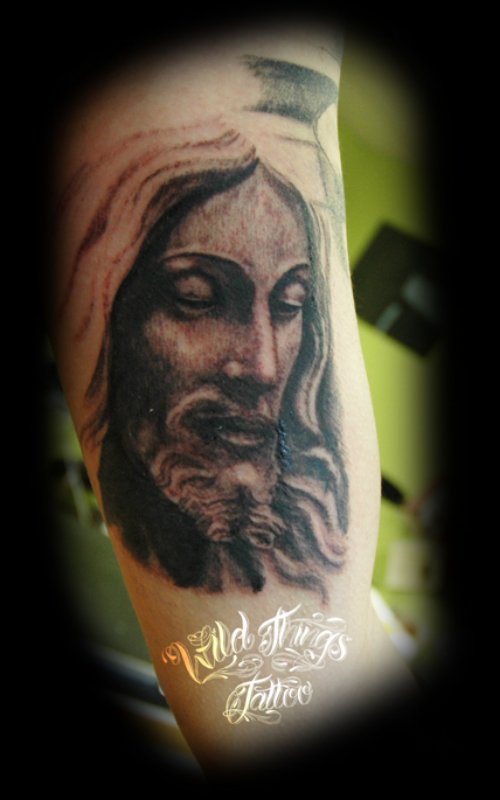 Grey Ink Jesus Christ Tattoo On Right Sleeve