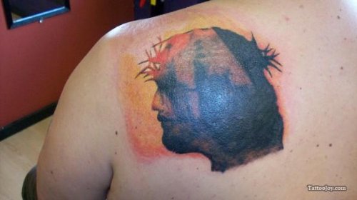 Black Ink Jesus Head Tattoo On Left Back Shoulder
