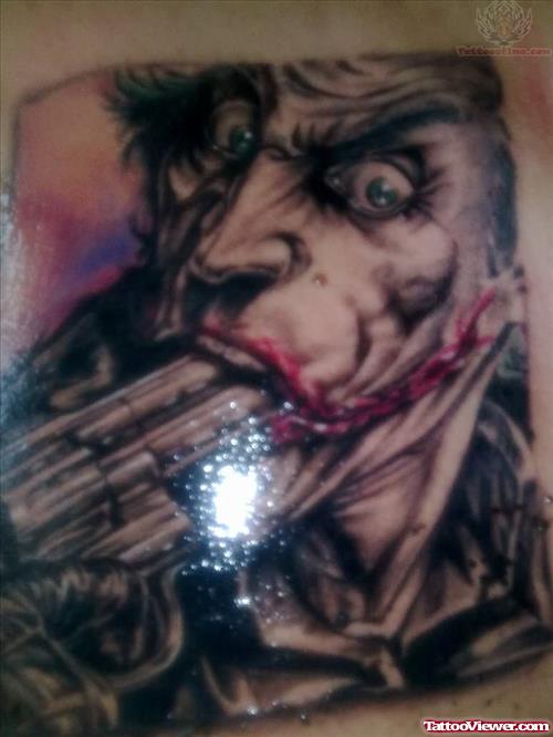 Dangerous Joker With Gun Tattoo