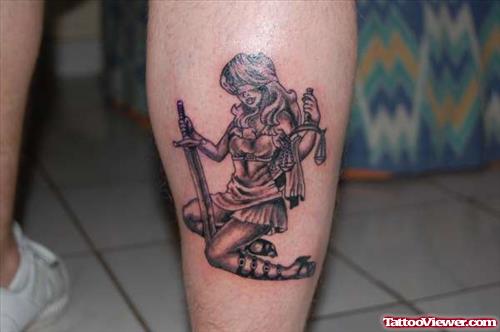 Grey Ink Lady Justice Tattoo On Right Leg