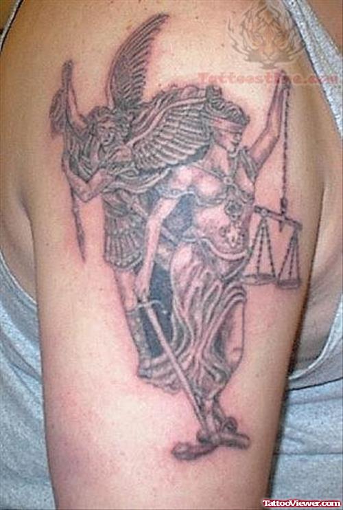 Grey Ink Justice Tattoo On Man Right Shoulder