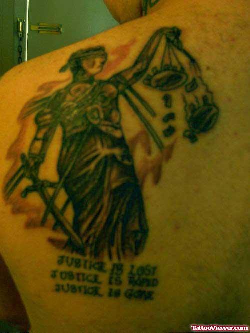 Justice Tattoo On Man Left Back Shoulder