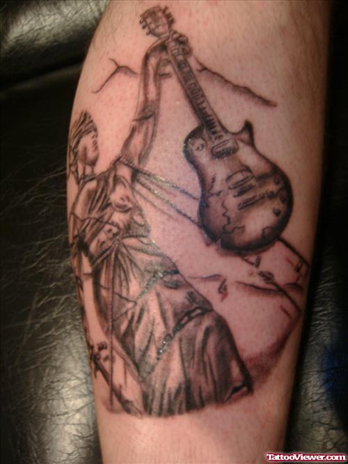 Grey ink Blind Lady With Guitar Justice Tattoo On Leg