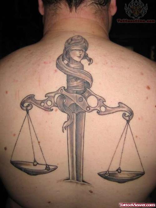 Scales Of Justice Tattoo On Back