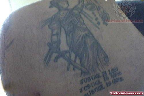 Upper Back Justice Tattoo