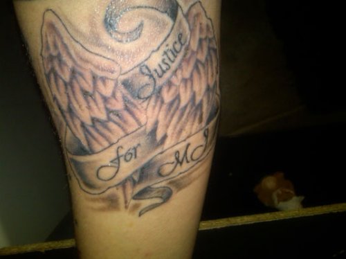 Angel Wings And Justice Banner Tattoo