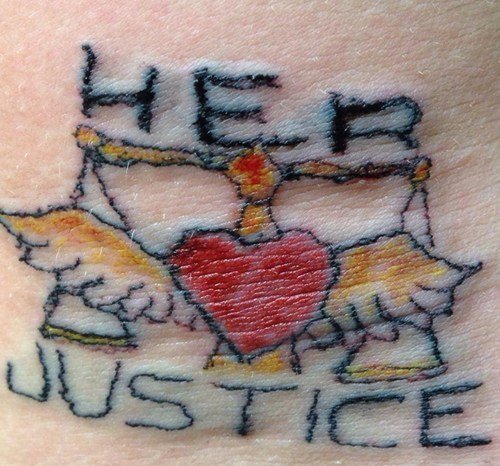 Her Love Justice Tattoo