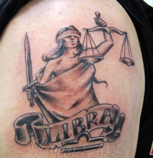 Libta Banner and Justice Tattoo On Shoulder