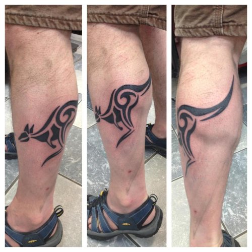 Black Ink Tribal Kangaroo Tattoo On Left Leg