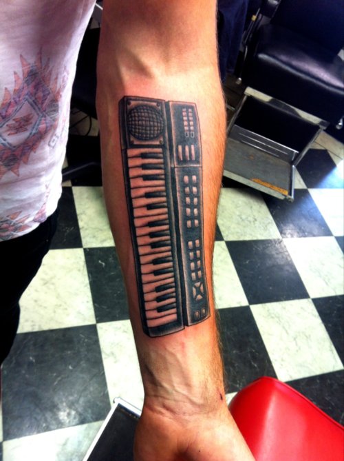 Keyboard Tattoo On Left Forearm