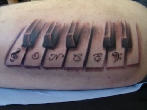 Awesome Grey Ink Piano Keyboard Tattoo