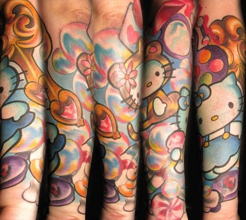 Colored Hello Kitty Tattoo On Full Sleeve
