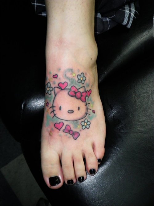 Kitty Head Tattoo On Girl Left Foot