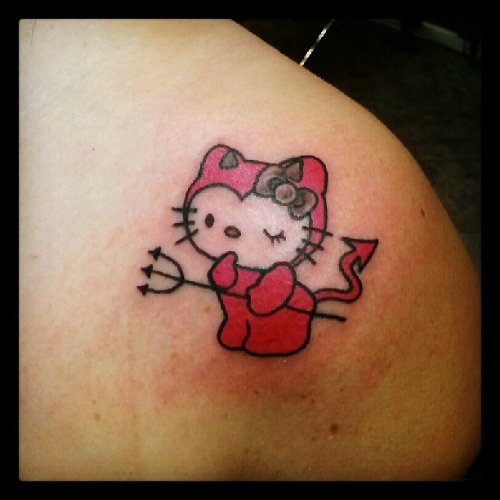 Red Ink Devil Hello Kitty Tattoo On Shoulder