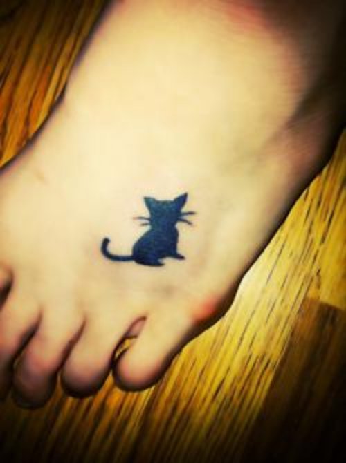 Black Ink Kitty Tattoo On Left Foot