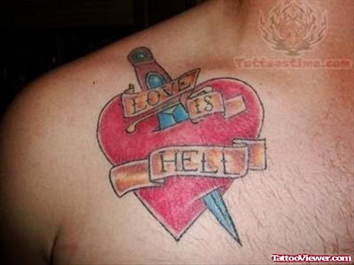Heart Dagger Tattoo On Chest