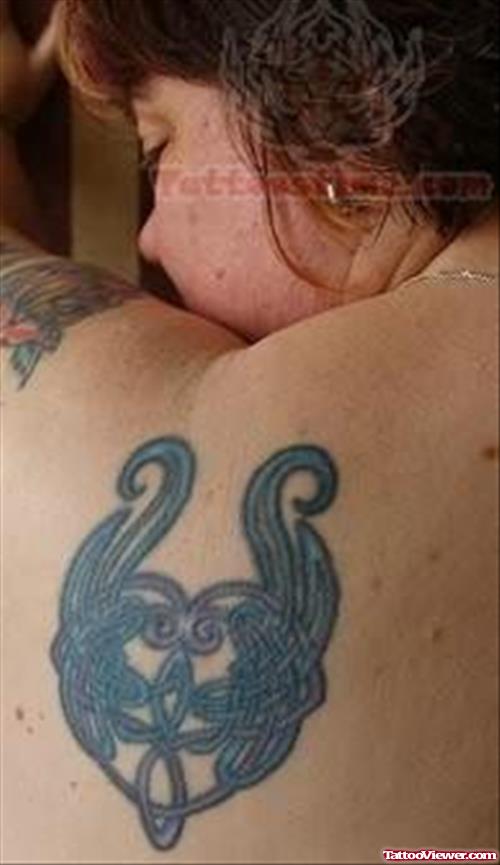 Nice Knot Tattoo On Back