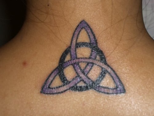 Purple And Black Trinity Knot Tattoo On Back