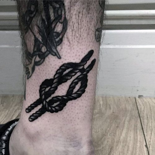 Black Ink Old School Knot tattoo On Ankle