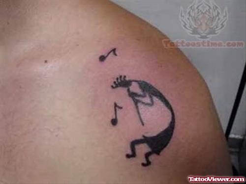 Kokopelli Tattoo On Upper Shoulder