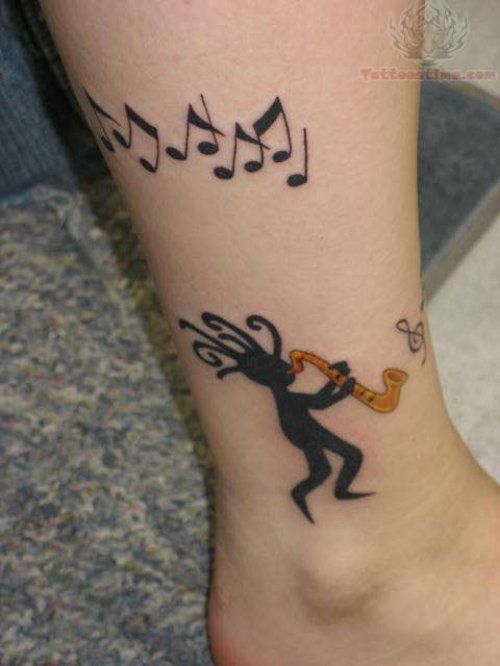 Kokopelli Playing Band Tattoo on Ankle