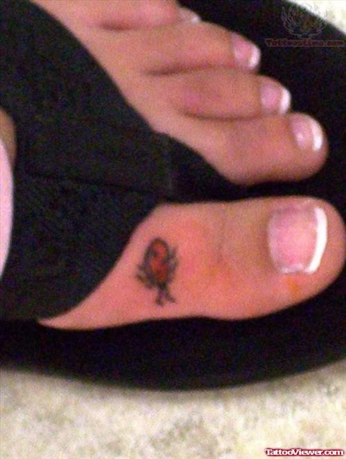 Ladybug Tattoo on Toe