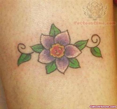Ladybug and Flower Tattoo