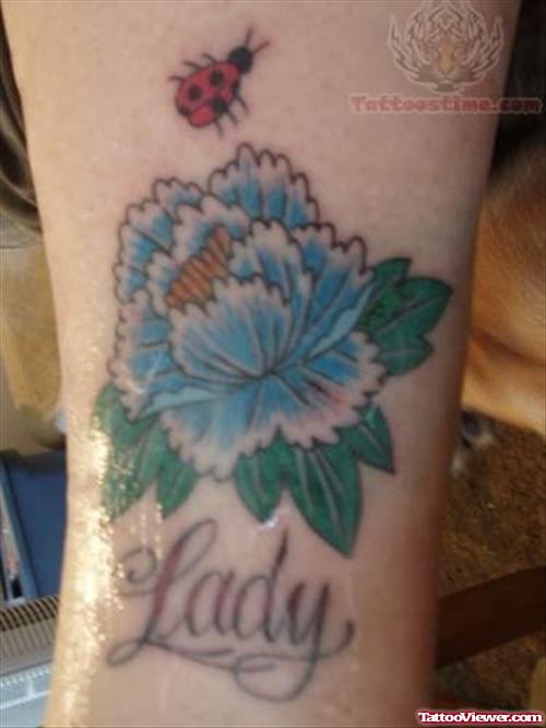 Flying Ladybug And Flower Tattoo