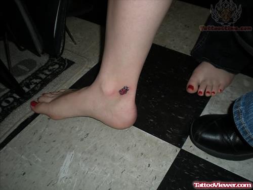 Ankle Ladybug Tattoo