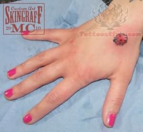 Ladybug Tattoo On Girl Hand