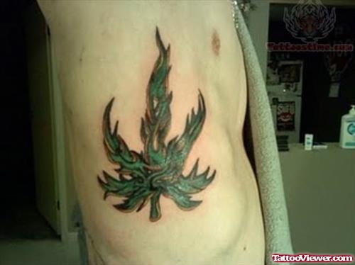 Leaf Tattoo On Rib