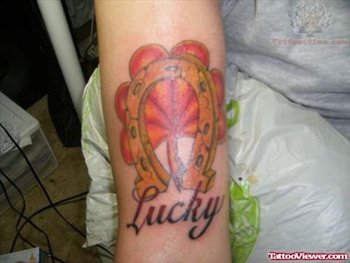 Leaf And Horseshoe Tattoo