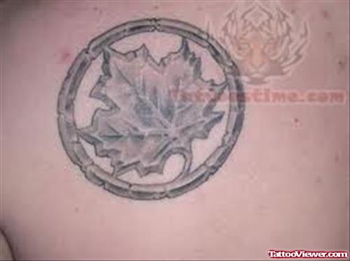Grey Ink Leaf Tattoo