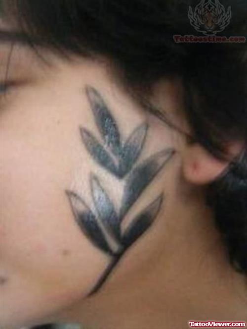 Leaf Tattoo On Face