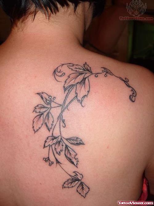 Leaf Design Tattoo On Back