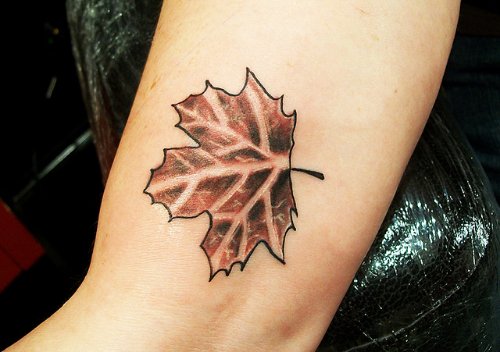Leaf Tattoo On Left Bicep