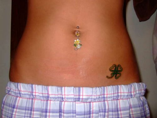 Three Leaf Tattoo On Left Hip